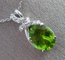 ESTATE 2.79CT DIAMOND & AAA PERIDOT 14KT WHITE GOLD 3D BOW OVAL FLOATING PENDANT