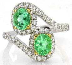 1.71CT DIAMOND & AAA EMERALD 18KT 2 TONE GOLD OVAL CRISS CROSS FLOWER LOVE RING