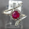 .52CT DIAMOND & AAA RUBY 18KT WHITE GOLD ROUND & MARQUISE CRISS CROSS FUN RING