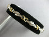 LONG 1.02CT DIAMOND 14KT 2 TONE GOLD BAGUETTE MULTI LEAF X LOVE TENNIS BRACELET