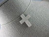 ESTATE. 75CT DIAMOND 18KT WHITE GOLD 3D CLASSIC THREE ROW CROSS FLOATING PENDANT