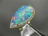 ESTATE EXTRA LARGE 8.13CT DIAMOND & AAA OPAL 14KT YELLOW GOLD CLASSIC HALO RING