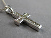 ESTATE SMALL .22CT DIAMOND 14KT WHITE GOLD ROUND CHANNEL CROSS FLOATING PENDANT
