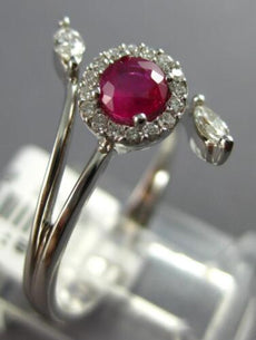 .52CT DIAMOND & AAA RUBY 18KT WHITE GOLD ROUND & MARQUISE CRISS CROSS FUN RING
