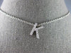 ESTATE .26CT DIAMOND 14KT WHITE GOLD 3D CLASSIC K INITIAL FLOATING PENDANT