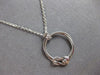 ESTATE .03CT DIAMOND 14KT WHITE GOLD SOLITAIRE LOVE KNOT CIRCLE OF LIFE NECKLACE