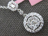 .52CT DIAMOND 14KT WHITE GOLD 3D ROUND & BAGUETTE CLUSTER HALO FLOATING PENDANT
