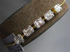 .92CT DIAMOND 18K YELLOW GOLD ROUND & BAGUETTE CLUSTER INVISIBLE TENNIS BRACELET