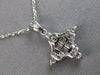 ESTATE .61CT DIAMOND 18KT WHITE GOLD ROUND & PRINCESS SNOWFLAKE FLOATING PENDANT