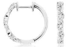 0.15CT DIAMOND 14KT WHITE GOLD 3D CLASSIC INFINITY LOVE HUGGIE EARRINGS