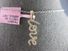 ESTATE .16CT DIAMOND 14KT YELLOW GOLD 3D CLASSIC SCRIPT LOVE FLOATING PENDANT