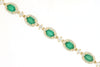 7.70CT DIAMOND & AAA EMERALD 14KT YELLOW GOLD OVAL & ROUND HALO TENNIS BRACELET