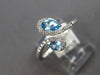 .81CT DIAMOND & AAA BLUE TOPAZ 14KT WHITE GOLD 3D PEAR SHAPE & ROUND LOVE RING