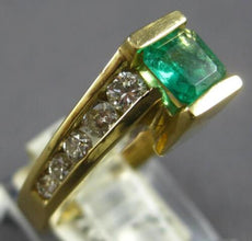1.30CT DIAMOND & AAA EMERALD 14KT YELLOW GOLD BAGUETTE & ROUND ENGAGEMENT RING