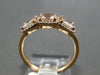 1.51CT DIAMOND & AAA MORGANITE 14KT ROSE GOLD 3D CUSHION & ROUND 3 STONE RING