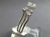ESTATE .26CT DIAMOND 14KT WHITE GOLD ETOILE DOUBLE FLOWER TENSION FUN LOVE RING