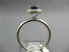 1.22CT DIAMOND & AAA SAPPHIRE 14KT WHITE GOLD ROUND TRIPLE HALO ENGAGEMENT RING