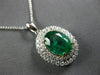 2.76CT DIAMOND & AAA EMERALD 18KT 2 TONE GOLD OVAL & ROUND HALO FLOATING PENDANT