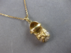 ESTATE .12CT DIAMOND 14KT 2 TONE GOLD 3D FLORAL BABY GIRL SHOE FLOATING PENDANT