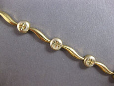 CLASSIC 14KT WHITE & YELLOW GOLD 3D MULTI CIRCULAR DIAMOND CUT WAVE FUN BRACELET