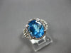 3.34CT DIAMOND & AAA BLUE TOPAZ 14KT WHITE GOLD OVAL & ROUND FUN LOVE KNOT RING