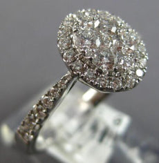 .82CT DIAMOND 18KT WHITE GOLD 3D CLASSIC ROUND CLUSTER HALO OVAL FRIENDSHIP RING