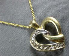 ESTATE .15CT DIAMOND 14KT 2 TONE GOLD 3D LOVE KNOT HEART SHAPE FLOATING PENDANT