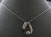 ESTATE .45CT DIAMOND 14KT WHITE GOLD ROUND & BAGUETTE TEAR DROP FLOATING PENDANT