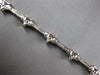 1.25CT DIAMOND 14KT WHITE GOLD 3D ROUND MULTI STAR BY THE YARD TENNIS BRACELET