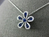 ESTATE .63CT DIAMOND & AAA SAPPHIRE 18KT WHITE GOLD FLOWER FLOATING LOVE PENDANT