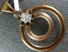 ESTATE .19CT DIAMOND 18KT ROSE GOLD 3D MATTE & SHINY FLOWER CIRCULAR FUN PENDANT