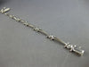 .26CT DIAMOND 14KT WHITE GOLD ROUND BEZEL ETOILE TRIANGULAR FUN TENNIS BRACELET