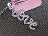 ESTATE .16CT DIAMOND 14KT WHITE GOLD 3D SCRIPT LOVE FLOATING PENDANT