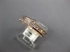 .33CT DIAMOND 14K ROSE GOLD 3D ROUND & PRINCESS CRISS CROSS ANNIVERSARY FUN RING