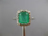 2.16CT DIAMOND & AAA EMERALD 14KT WHITE GOLD 3D ROUND & BAGUETTE ENGAGEMENT RING