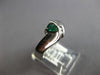 .43CT DIAMOND & AAA EMERALD 14K WHITE GOLD TRILLION & ROUND CRISS CROSS FUN RING