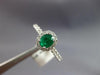.72CT DIAMOND & AAA EMERALD 18KT WHITE GOLD 3D OVAL & ROUND HALO ENGAGEMENT RING