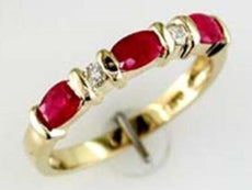 1.10CT DIAMOND & AAA RUBY 14KT YELLOW GOLD OVAL & ROUND CHANNEL ANNIVERSARY RING