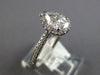 .86CT DIAMOND 14KT WHITE GOLD 3D CLASSIC PEAR SHAPE & ROUND HALO ENGAGEMENT RING