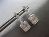 ESTATE .45CT DIAMOND 14KT WHITE GOLD ROUND & BAGUETTE INVISIBLE HANGING EARRINGS