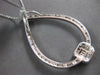 1.37CT DIAMOND 14KT WHITE GOLD ROUND & BAGUETTE OPEN TEAR DROP FLOATING PENDANT