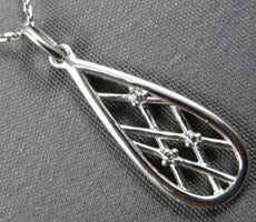 ESTATE .01CT DIAMOND 14KT WHITE GOLD 3D TEAR DROP CRISS CROSS FLOATING PENDANT