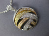 ESTATE .86CT DIAMOND 18KT TRI COLOR GOLD 3D CIRCULAR CRISS CROSS FUN PENDANT