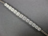 ESTATE 1.28CT DIAMOND 18K WHITE GOLD CLUSTER ROUND SQUARE SEMI ETERNITY BRACELET