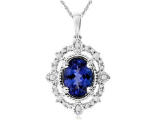 1.59CT DIAMOND & TANZANITE 14KT WHITE GOLD OVAL & ROUND FILIGREE FLOWER PENDANT