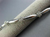 ESTATE LONG 1.40CT DIAMOND 14KT WHITE GOLD 3D FLOWER BY THE YARD TENNIS BRACELET