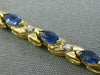 ESTATE 1.21CT DIAMOND & AAA MARQUISE SAPPHIRE 14KT TWO TONE GOLD X LOVE BRACELET