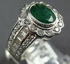 WIDE 2.19CT DIAMOND & EMERALD 18KT WHITE GOLD OVAL ROUND & BAGUETTE FLOWER RING