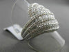 ESTATE 2.15CT BAGUETTE & ROUND DIAMOND 18KT WHITE GOLD INTERTWINNING FUN RING