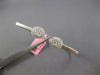 WIDE .60CT DIAMOND 14KT WHITE GOLD CLUSTER DOUBLE OVAL FLEXIBLE BANGLE BRACELET